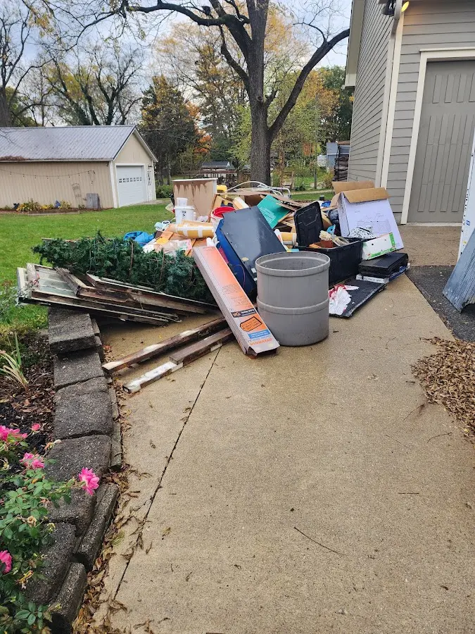 Dumpster being loaded with debris for Commercial Dumpster Rental in East Drumore